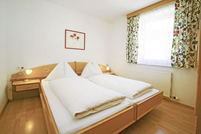 Schlafzimmer - Ferienwohnungen in Flachau, Ferienwohnung Bergkristall, Appartements Dertnig