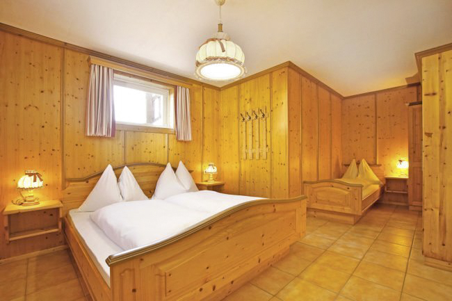 Schlafzimmer - Ferienwohnung Edelweiß, Flachau